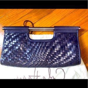 Cole Haan woven leather clutch